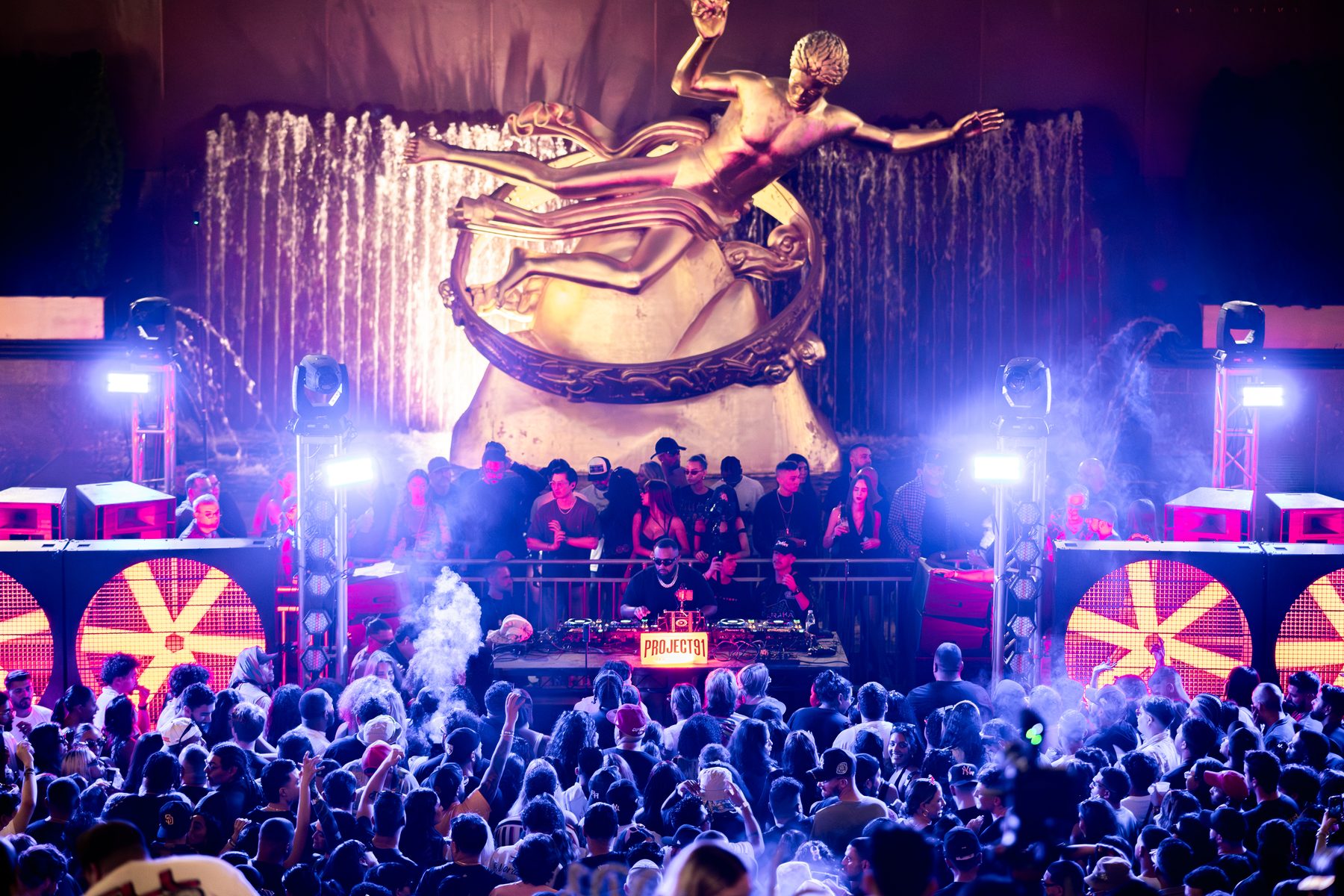 DJ set at Rockefeller Center with lighting and LED under the Prometheus statue